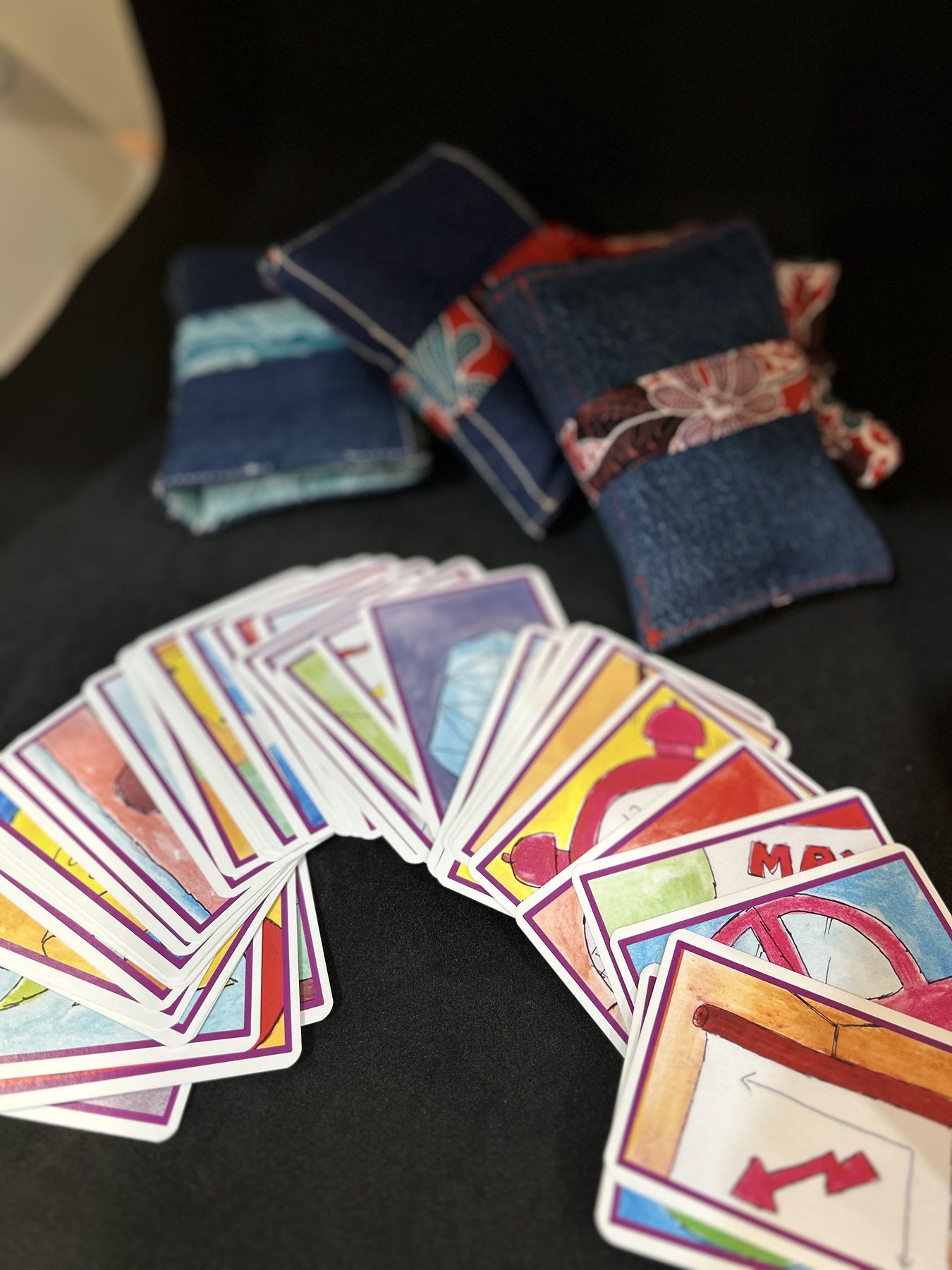 A spread of colourful Ti Yan cards